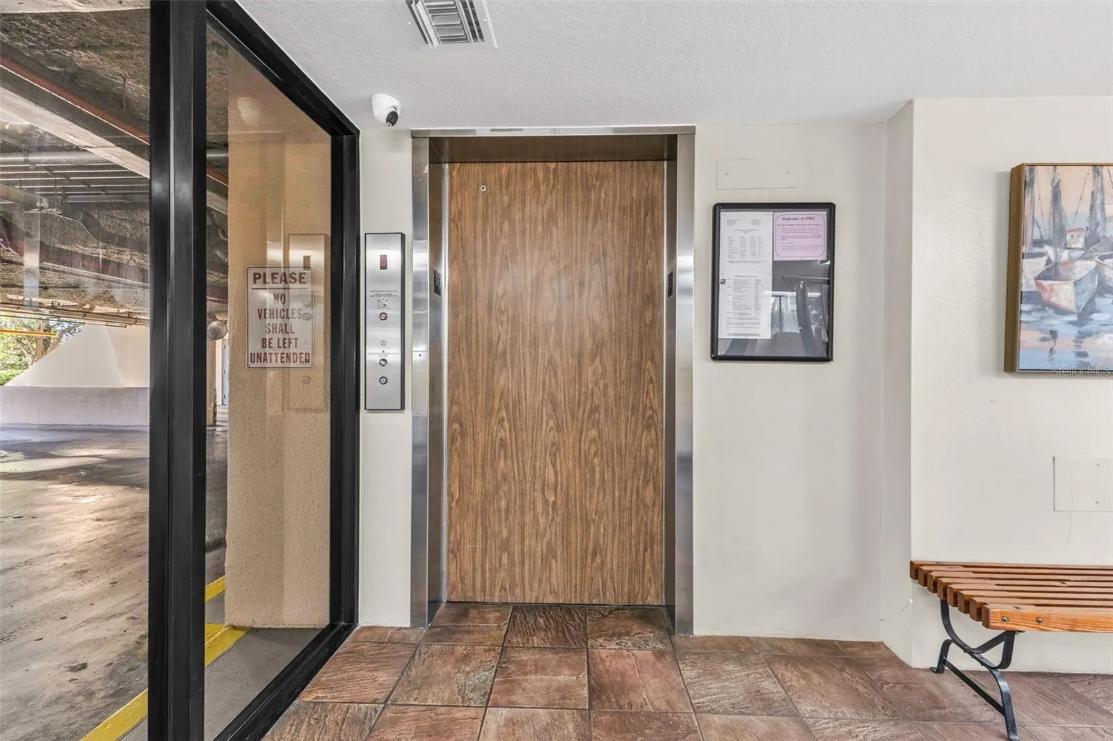 Elevator through secured entry