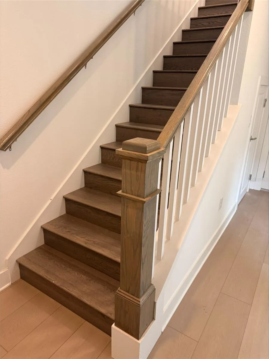Open railing with engineered wood treads