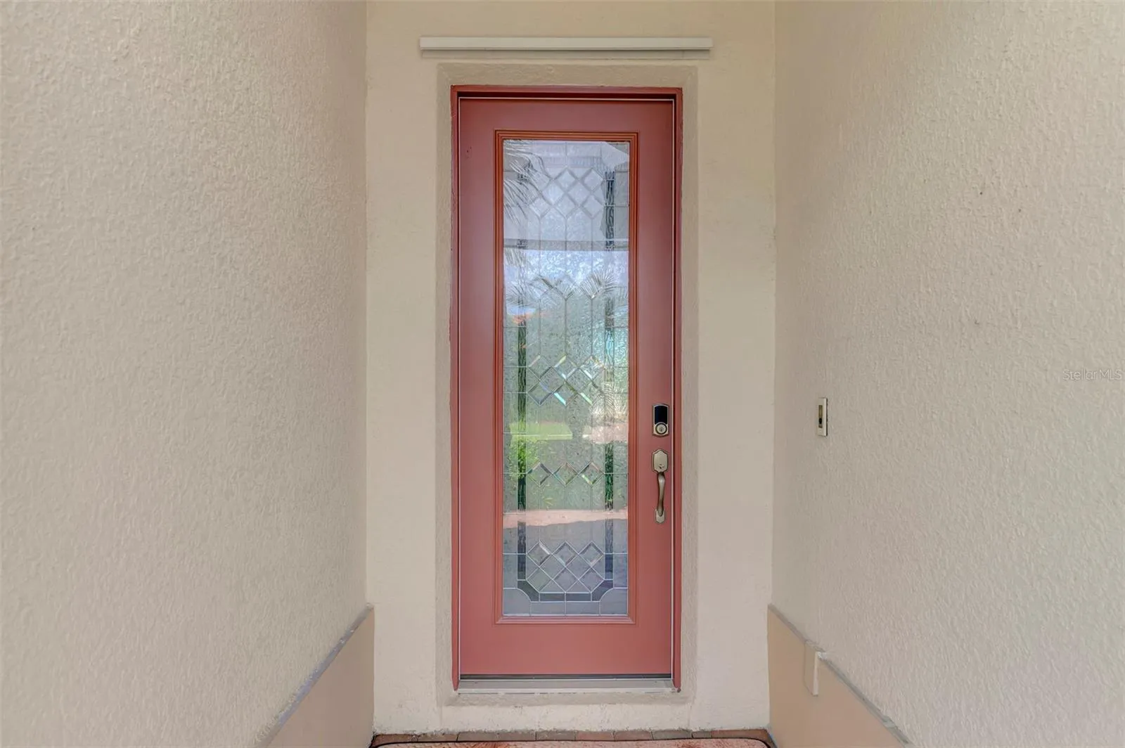 Elegant Tempered-Glass Entry Door.