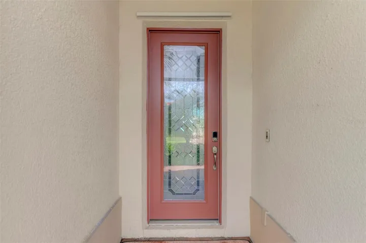 Elegant Tempered-Glass Entry Door.