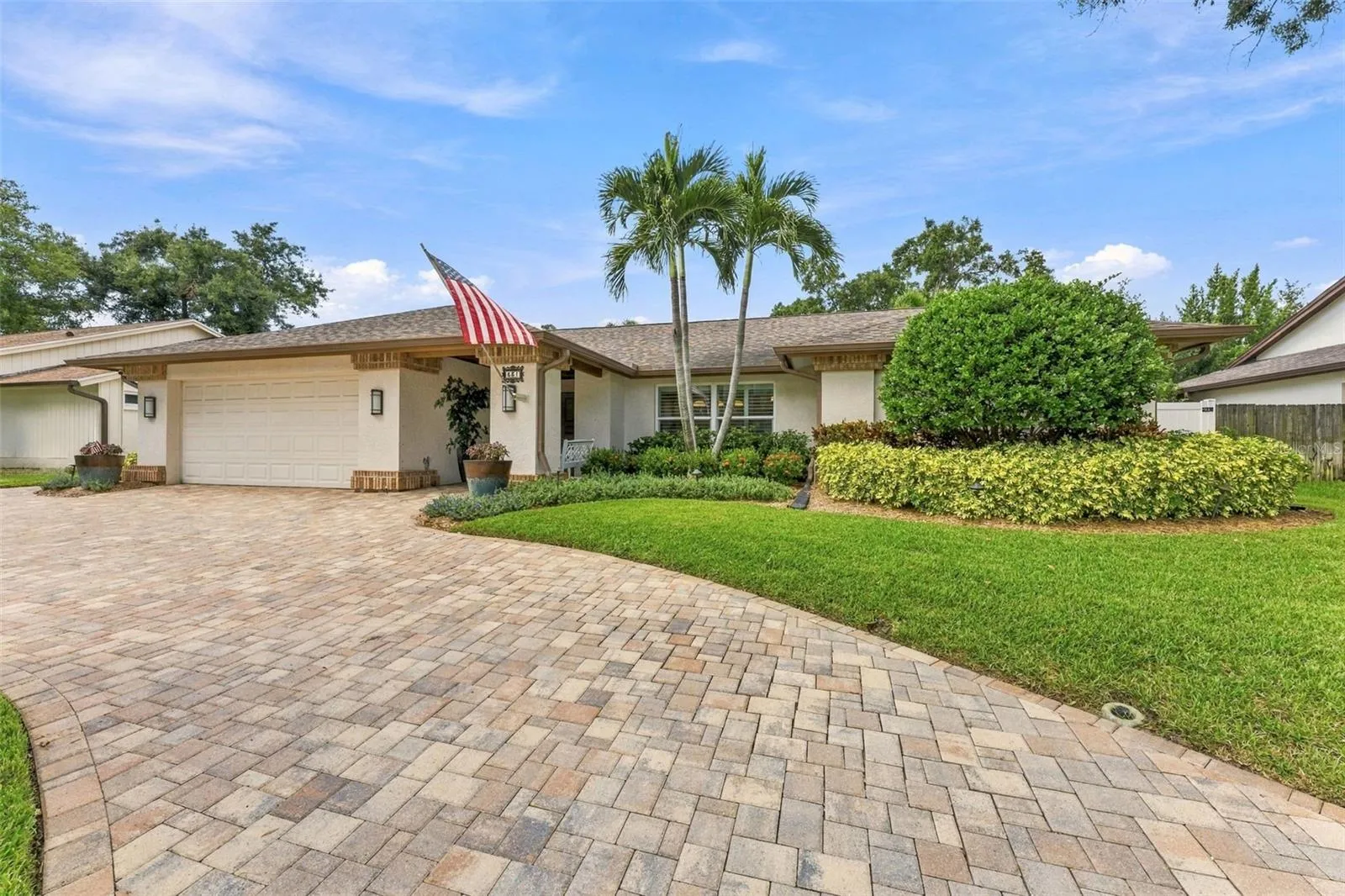Lush, Beautifully Maintained Landscaping Enhances the Home’s Curb Appeal