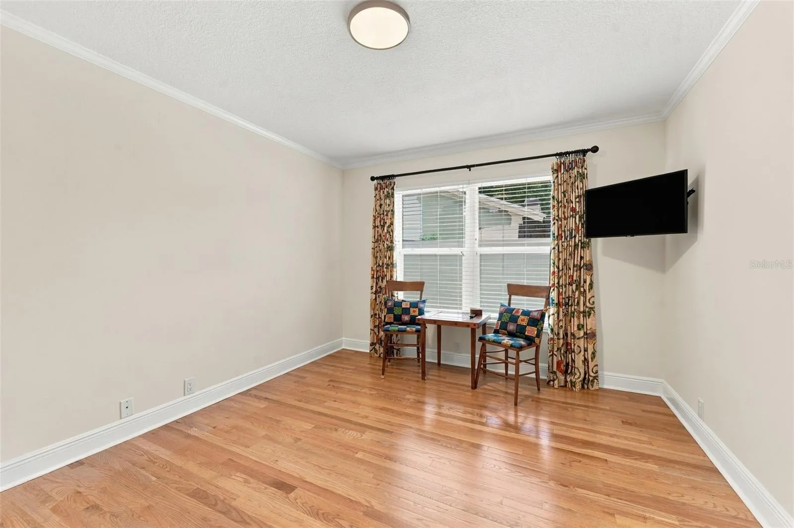 Bedroom 3 with a Large Window Filling the Room with Natural Light