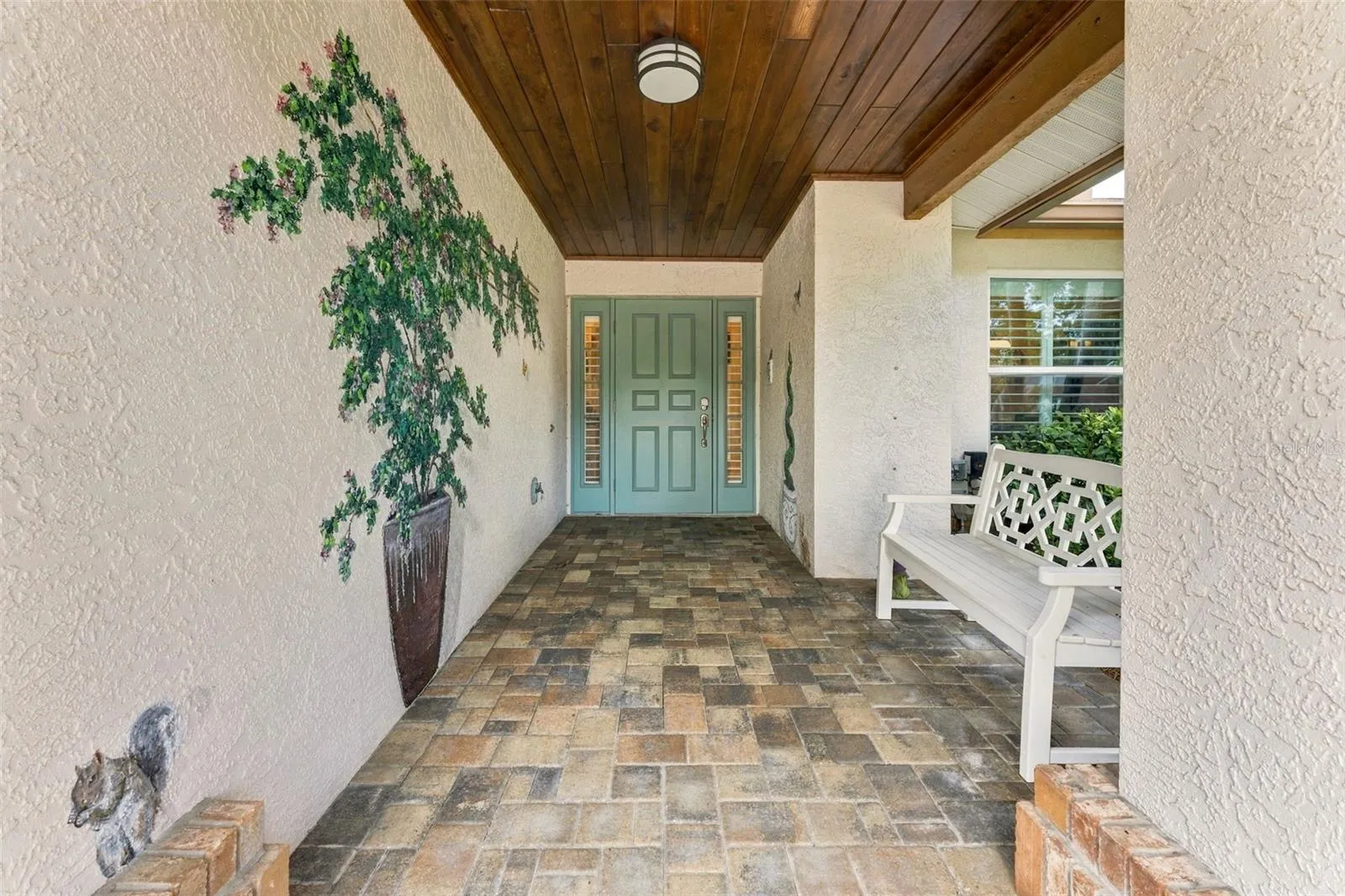 Inviting Front Entry with Beautiful Tongue-and-Groove Wood Ceiling