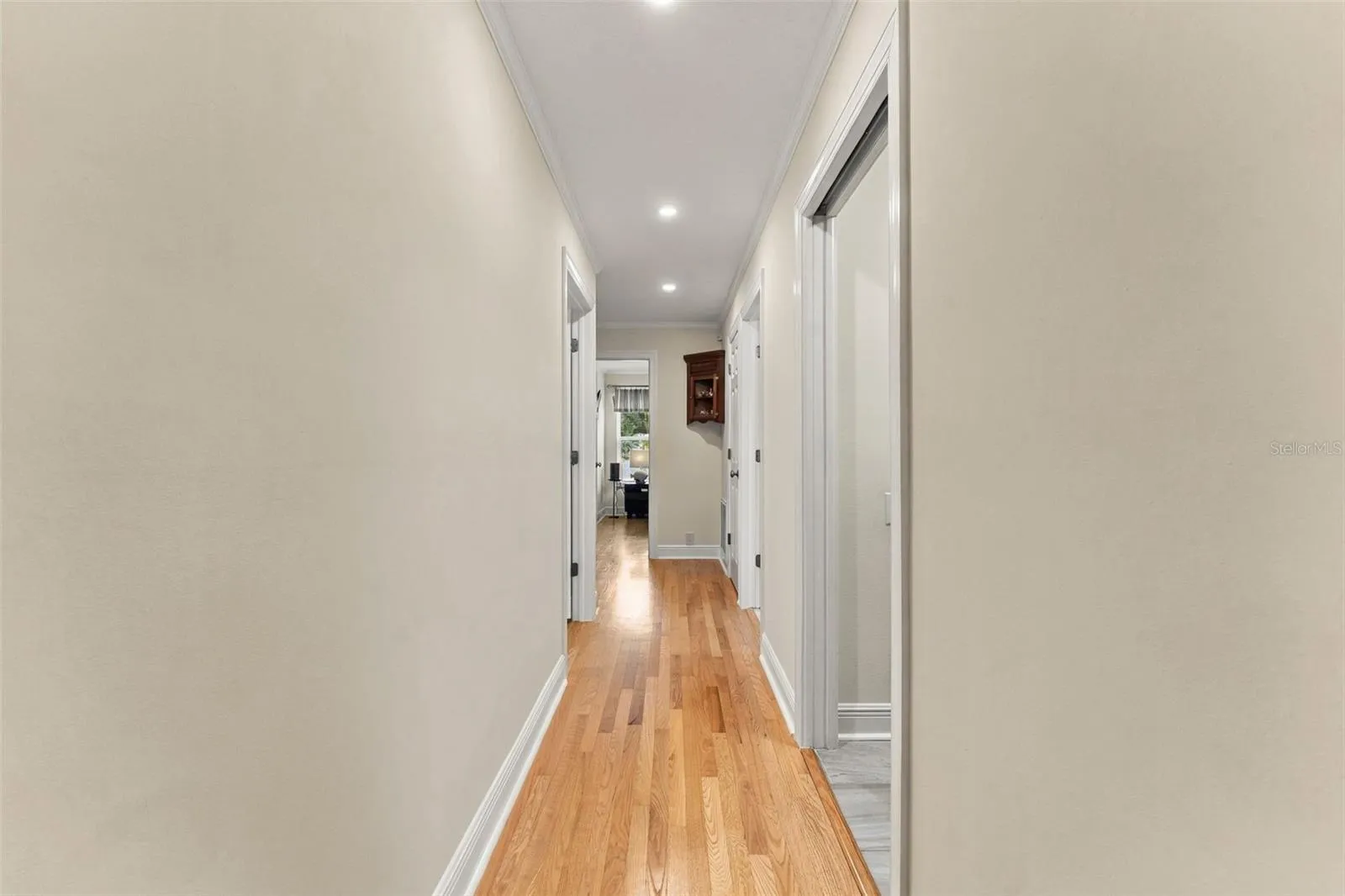 Hallway Leading to Three Additional Bedrooms & Full Bath