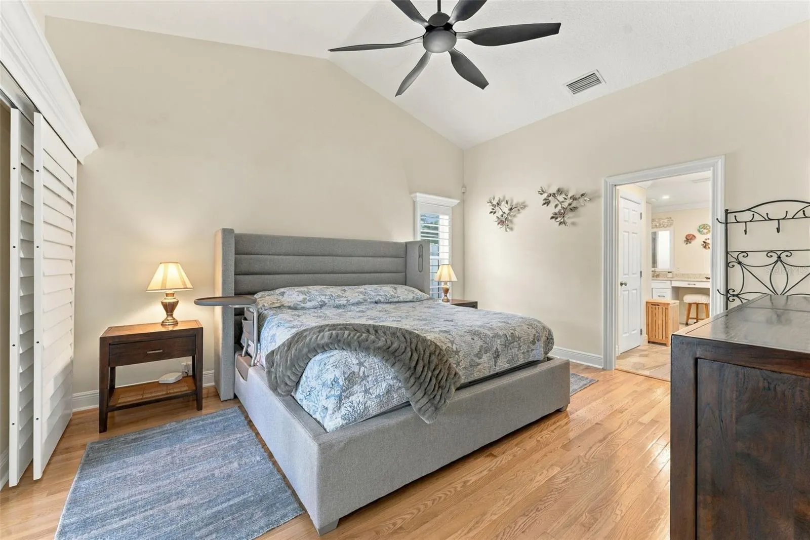 Spacious Primary Bedroom with Beautiful Plantation Shutters