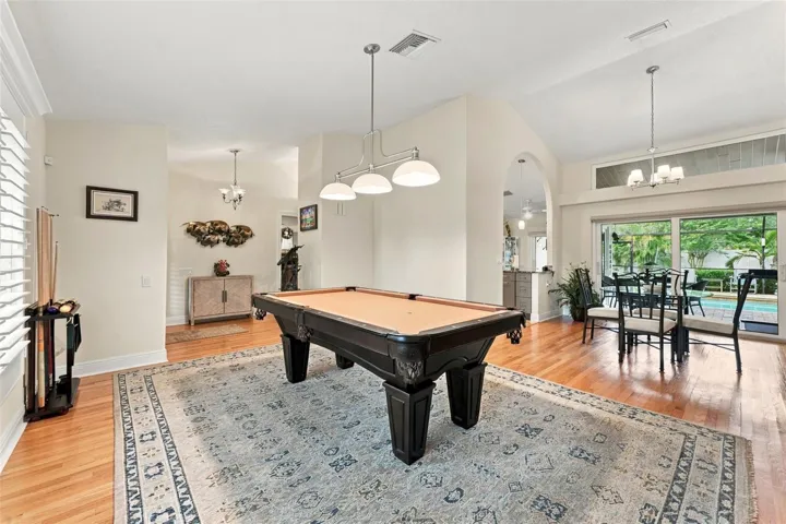 Formal living room with pool table