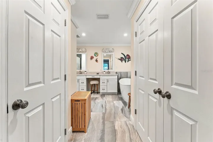 Private Primary En Suite with Dual Custom Closets & Beautifully Updated Bathroom