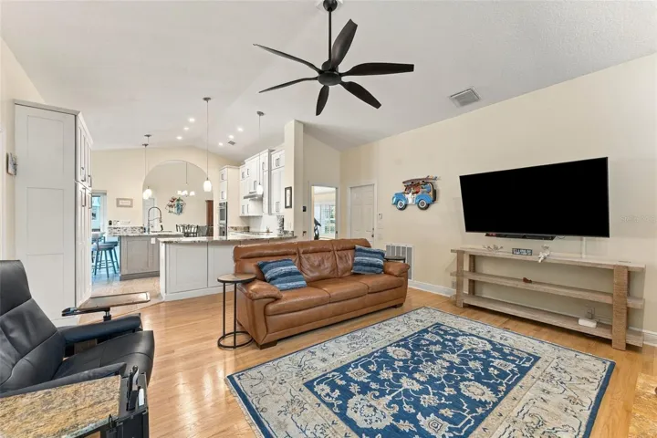 Family Room Flows Seamlessly into the Beautiful Custom Kitchen