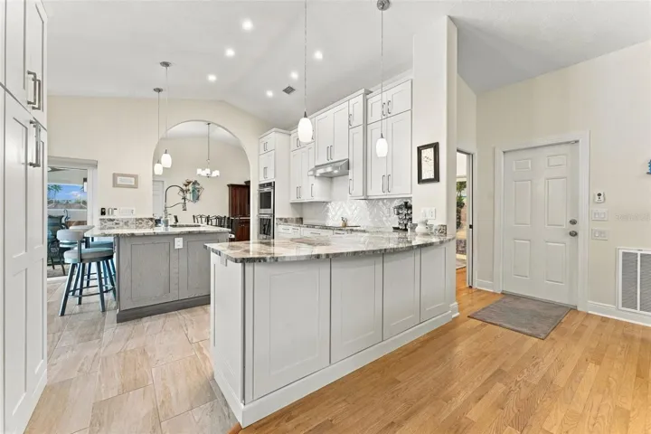 Oversized Kitchen Island with Plenty of Bar Seating for Entertaining