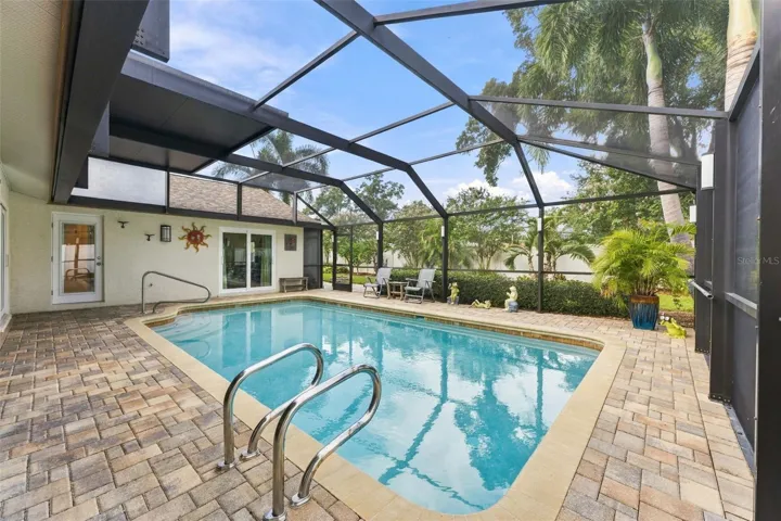 Recently Resurfaced Saltwater Pool Surrounded by a Beautiful Pavered Deck