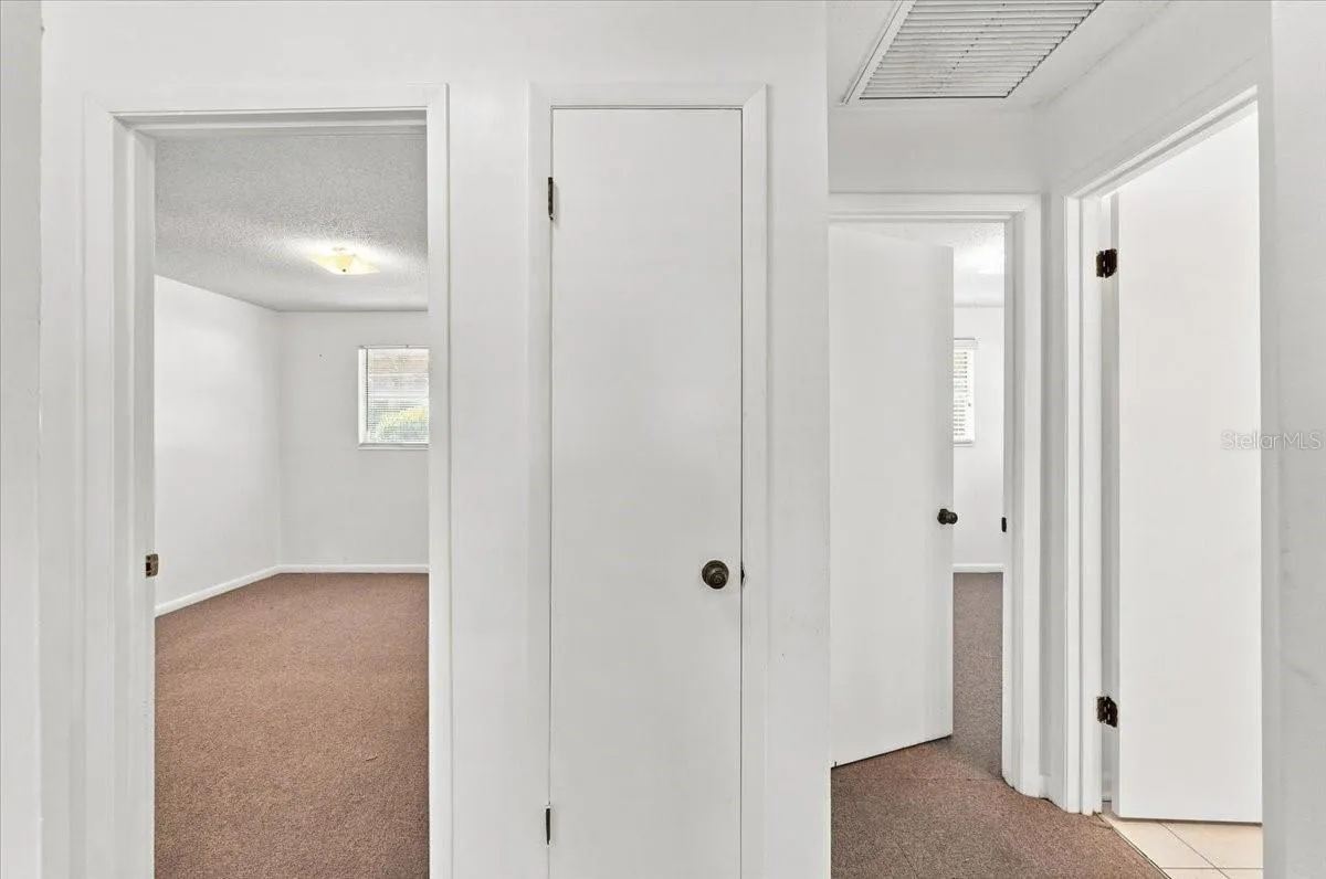 unit 917 hallway to BR's & bathroom