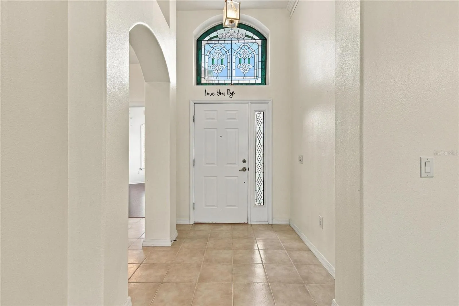 Custom domed transom & sidelight windows made by a High Vista artisan