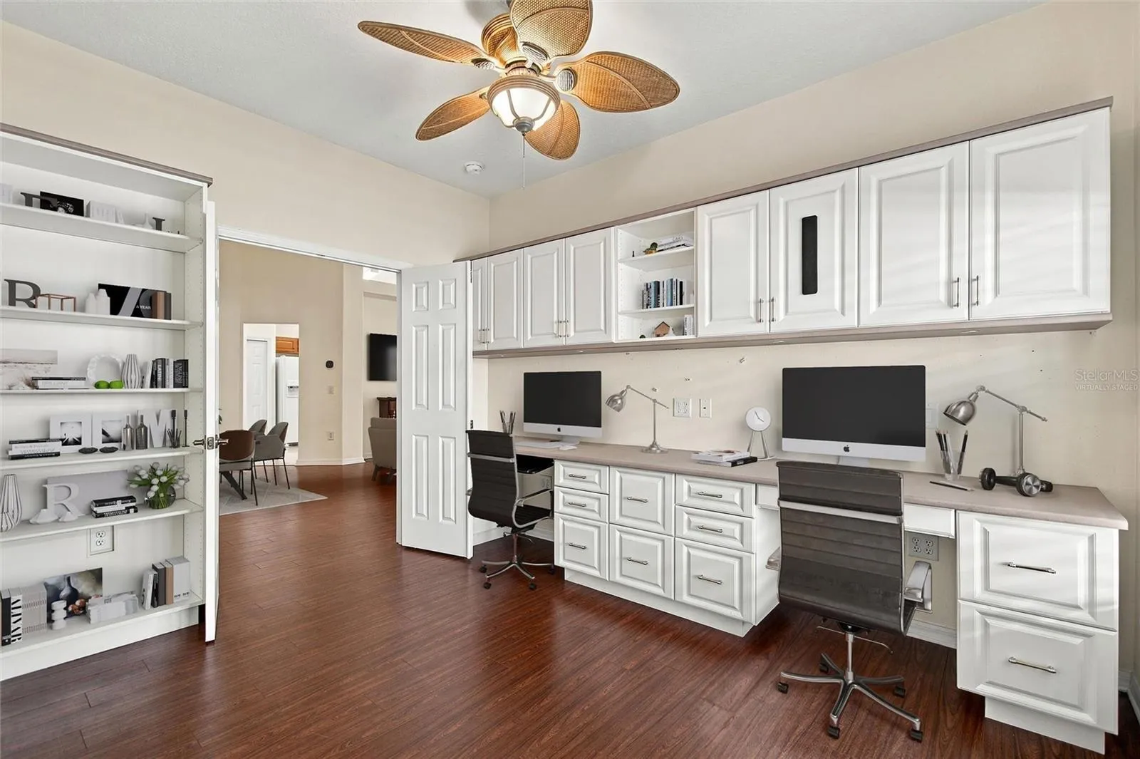 Virtually Staged office equipment & supplies in center guest room/office