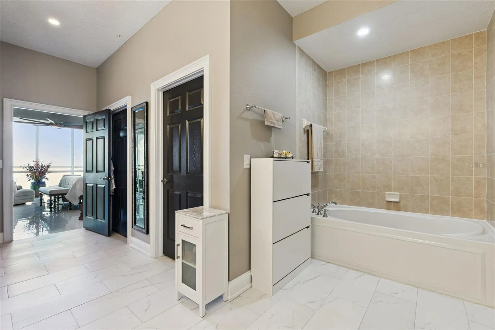 Primary bathroom with water closet.
