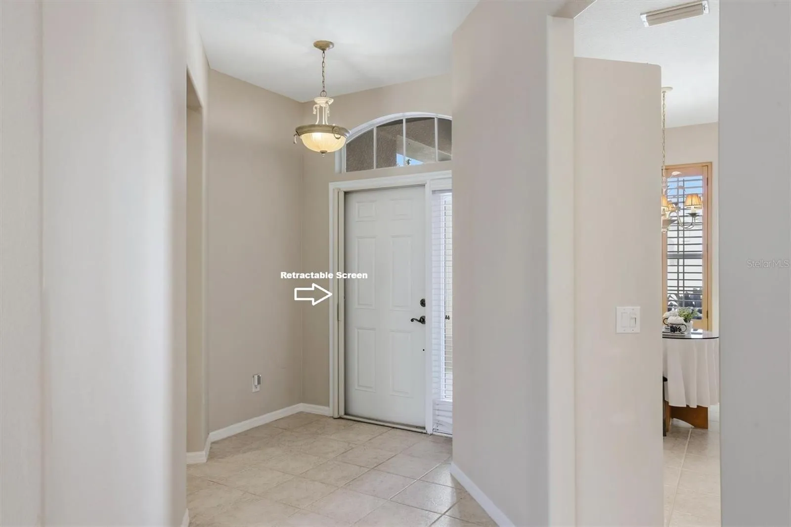 Foyer with Retractable Front Door Screen