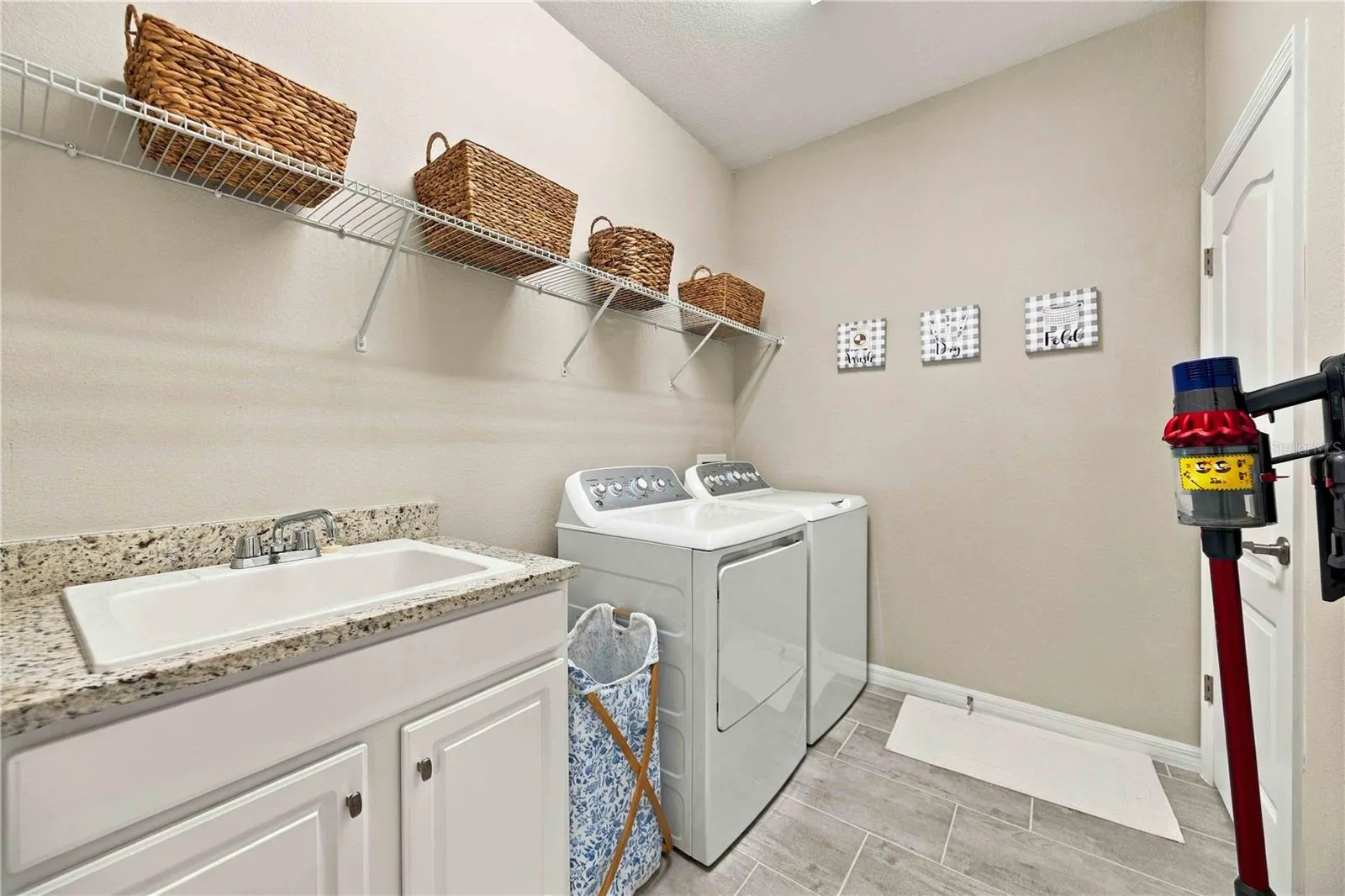 The laundry room has a large utility closet, washer /dryer comes with the unit and ample storage for soaps, and other items you may need.