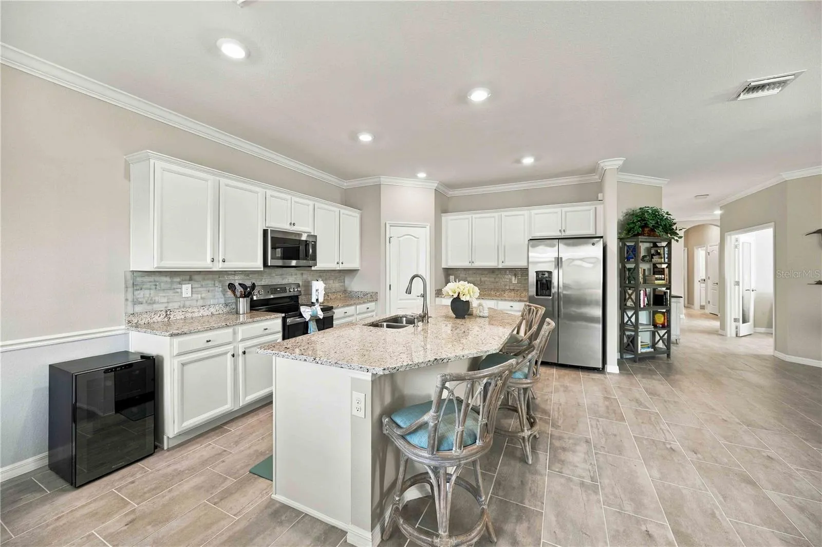 he kitchen is great, pantry, stove, center island, long walkway - the home is gently lived in.