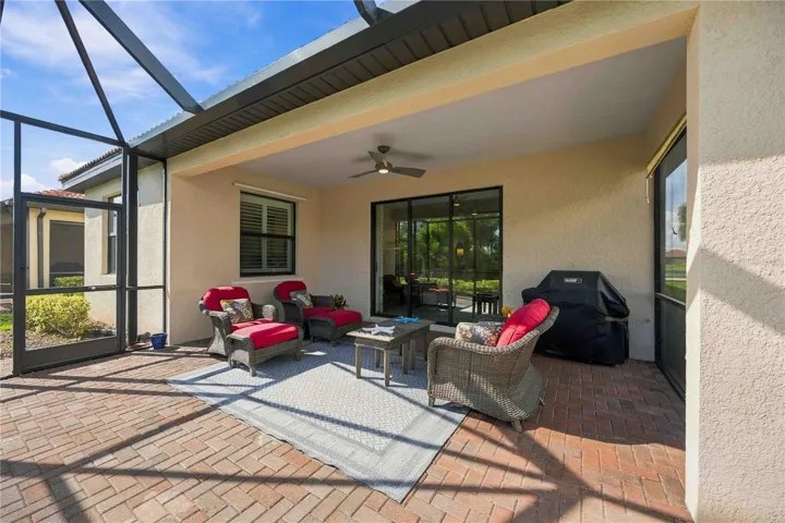 The outside retreat is simply beautiful - a solar screen keeps the direct sun out, but the wildlife and preserve views are stunning all day and evening.  Plenty of space to grille dinner