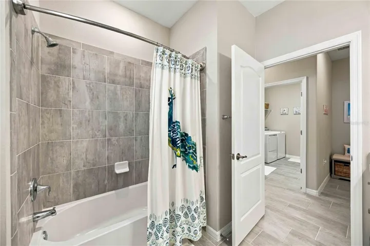 The guest bath is large, welcoming to guests and easy to manuever in with a tub/shower combination.