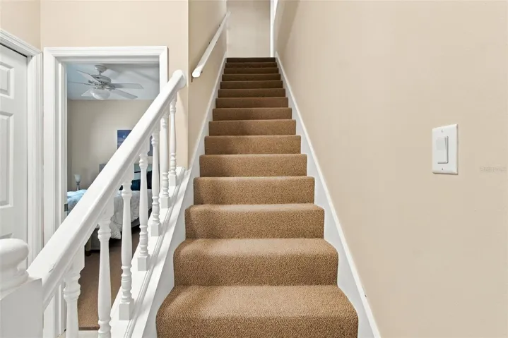 Stairs to loft/possible 4th bedroom