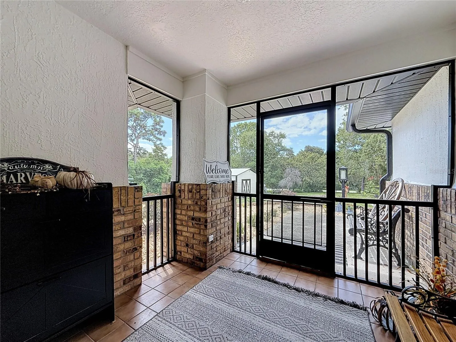 inside the front screened in porch