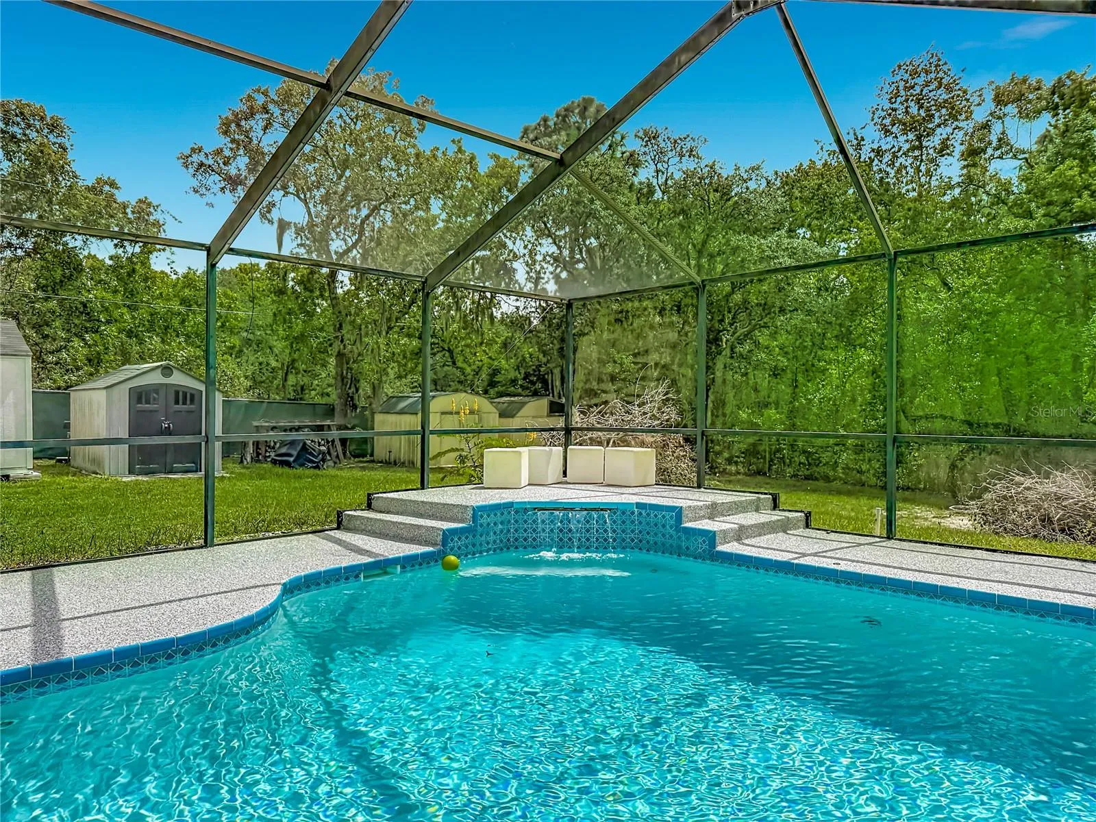 pool with waterfall into the pool