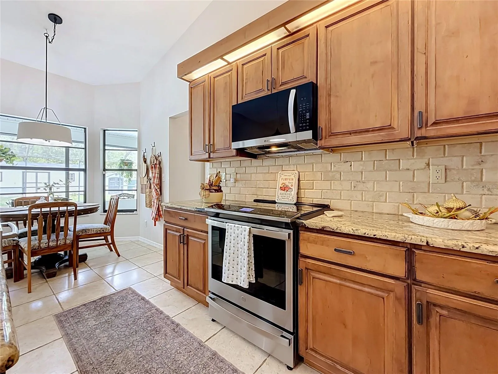 bay window with eat in kitchen area
