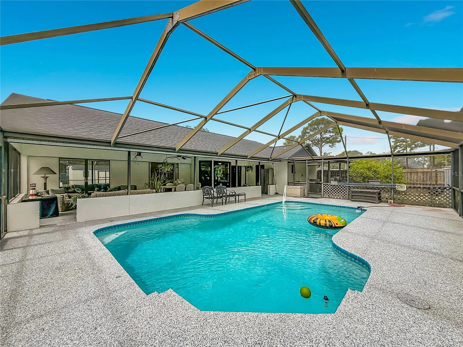 Large covered, enclosed patio for entertaining, great size pool!