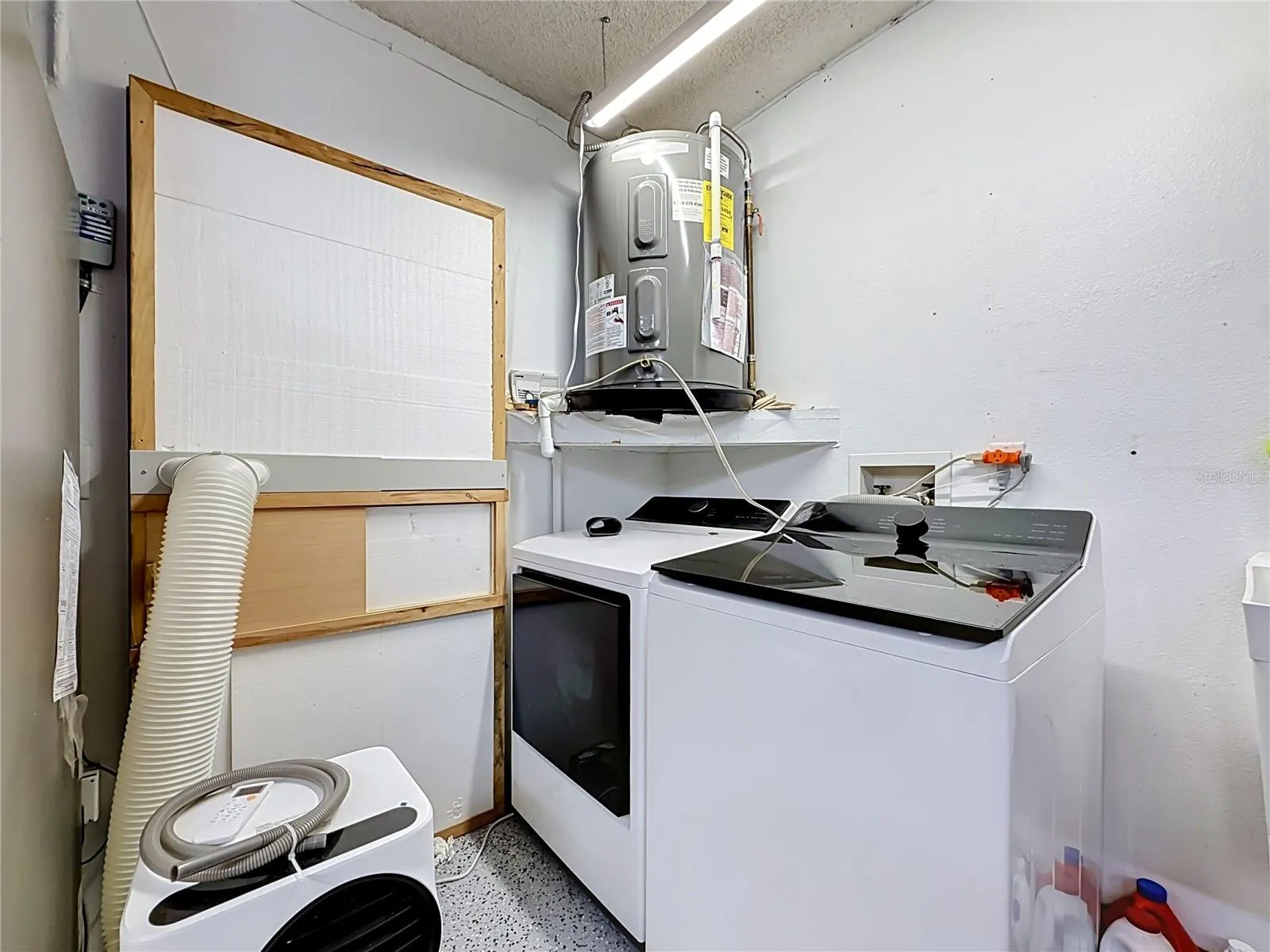 Electric water heater is a 2025, washer N dryer 2025.