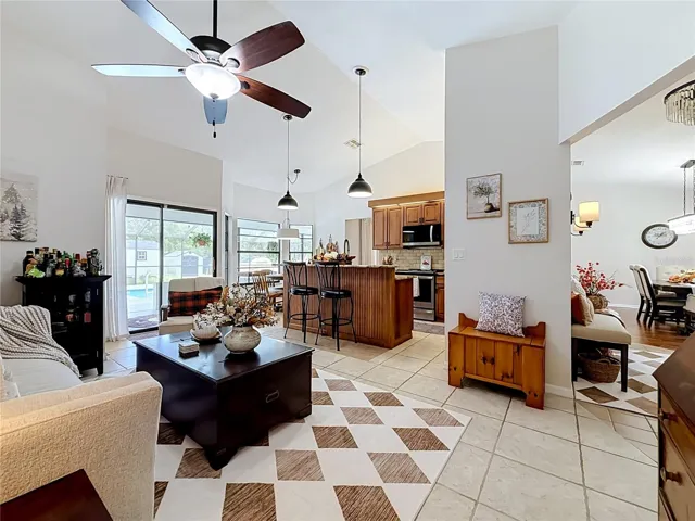 family room is open to kitchen with high ceilings