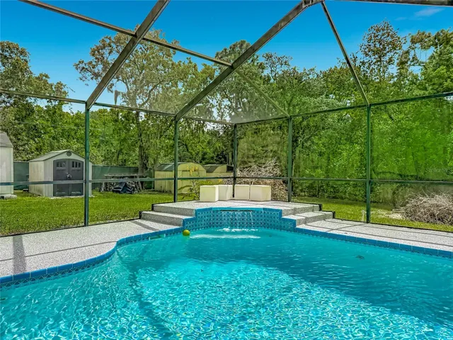 pool with waterfall into the pool