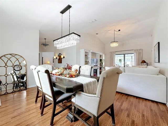 Formal dining room area open to living room