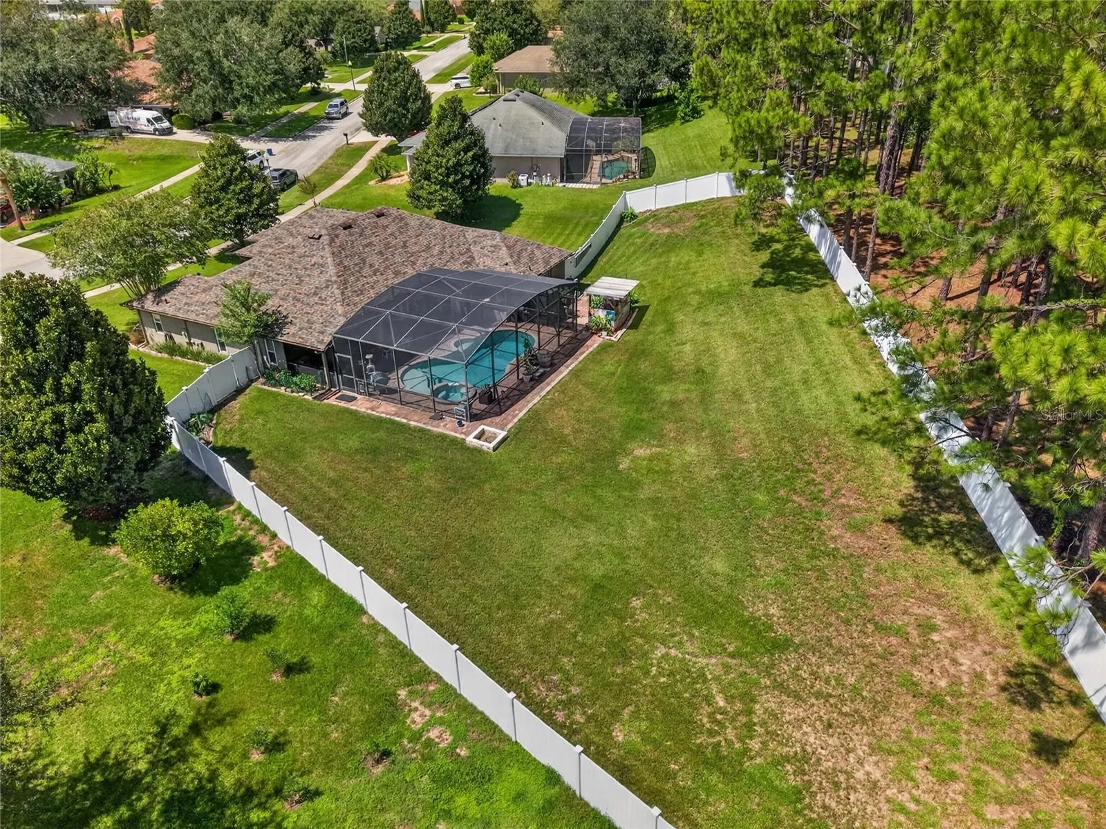 Aerial of fully fenced backyard