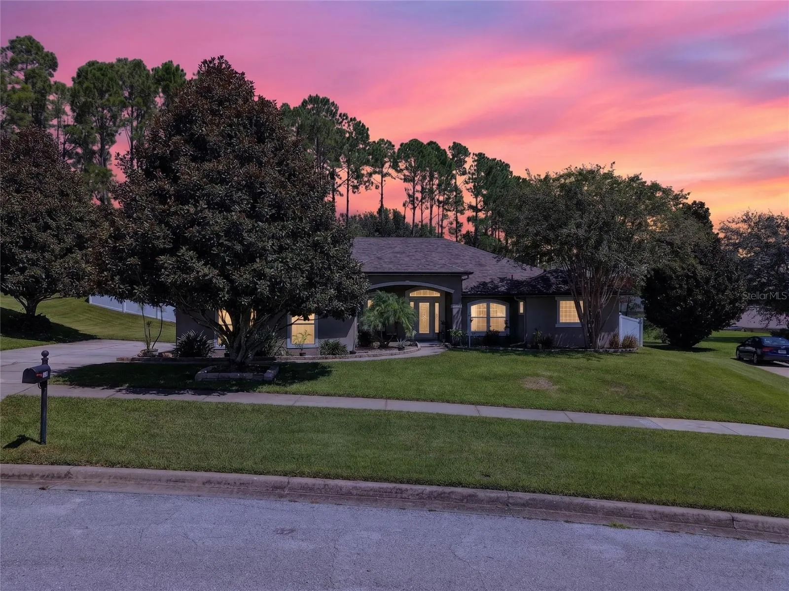 Twilight image of front of property