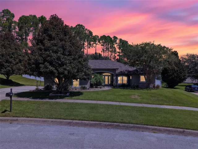 Twilight image of front of property