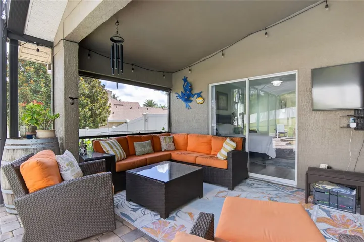 Pool Deck (covered lanai area w/ roll down shade)