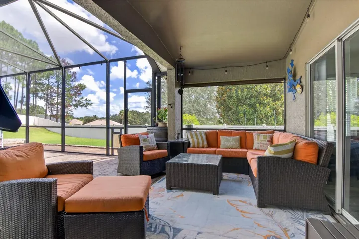 Pool Deck (covered lanai area w/ roll down shade)