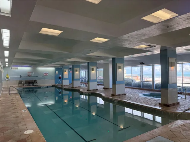 Indoor pool and jacuzzi with ocean views
