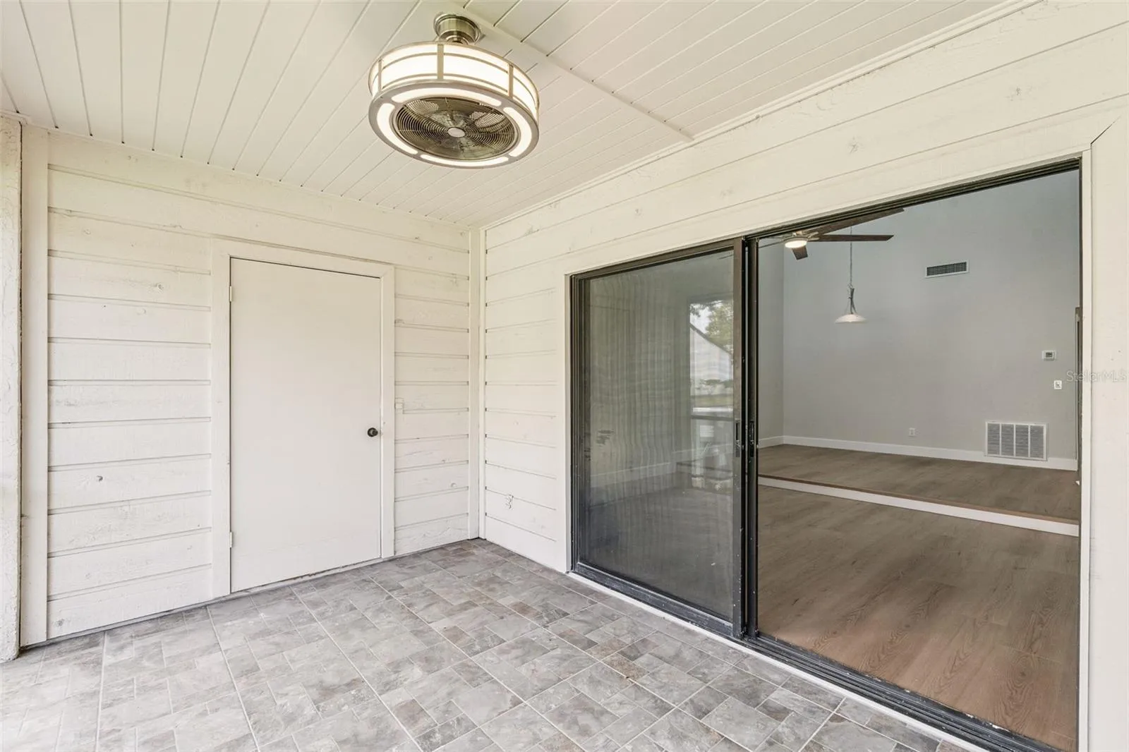 Back patio has storage closet.