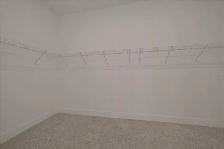 PRIMARY WALK-IN CLOSET