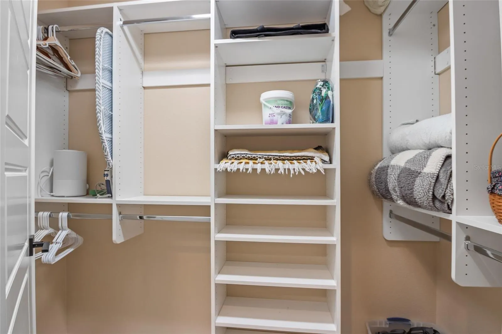 Custom shelving in his and her closets.