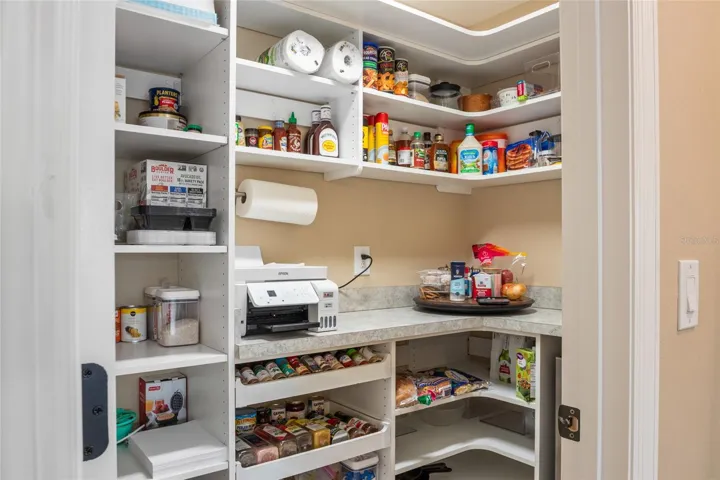 Custom shelving in pantry closet.
