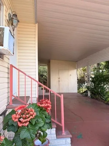 UTILITY AND LAUNDRY ROOM BACK OF CARPORT