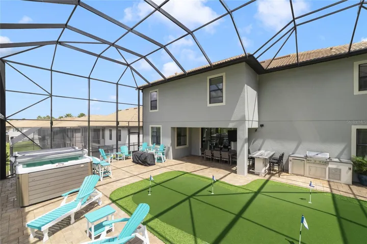 Lanai with putting green and swim spa