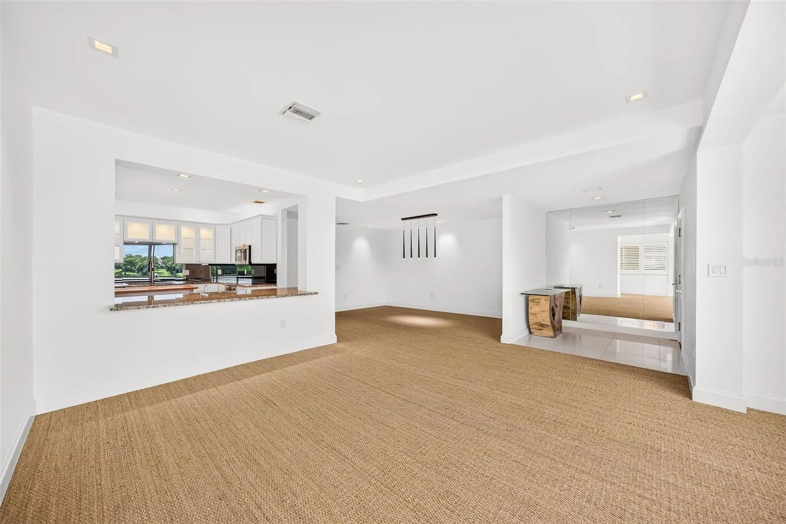Lake Front Great Room opens to Dining Area and Kitchen