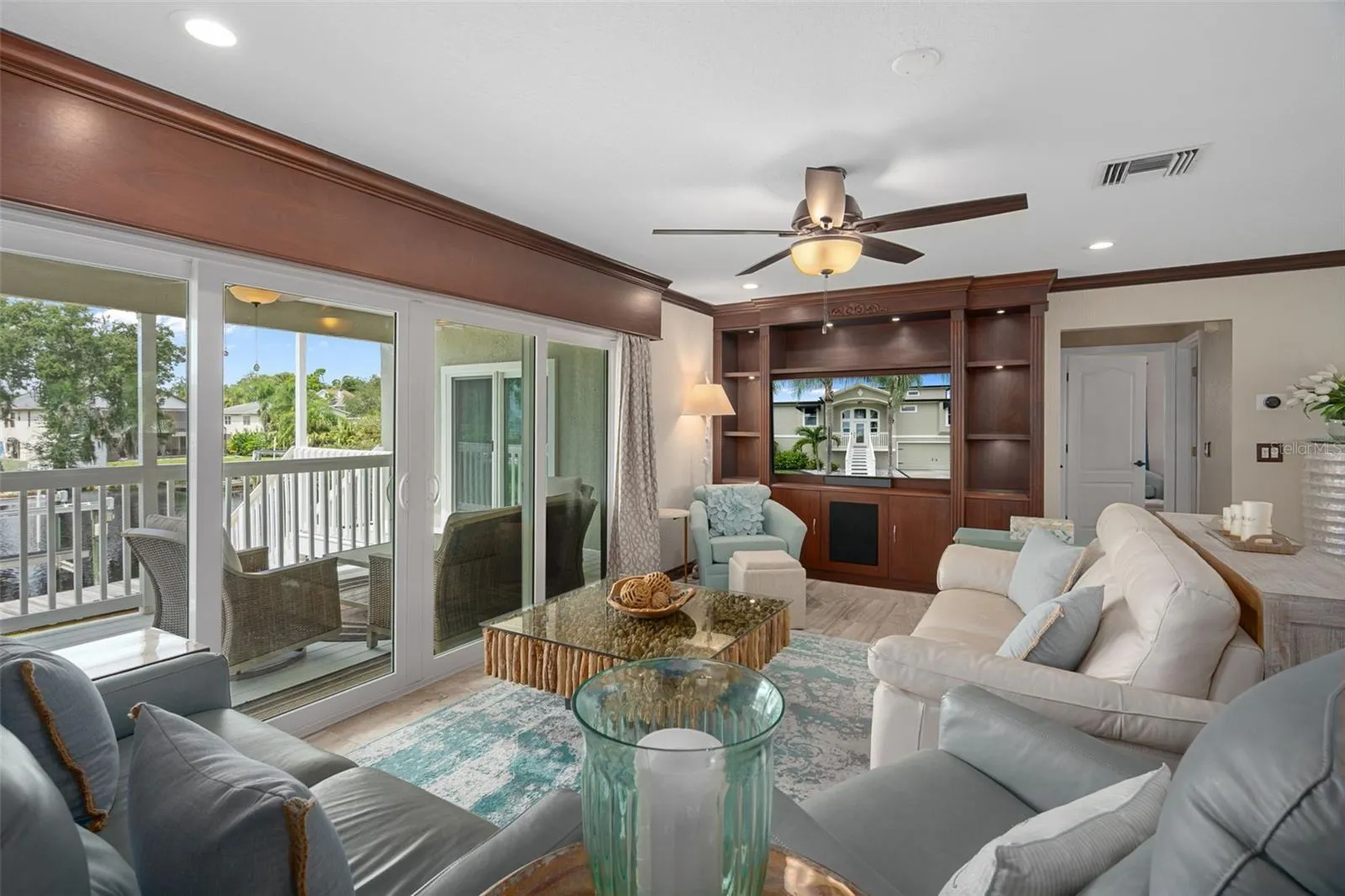 Living room with built-ins, RIVER FRONT view