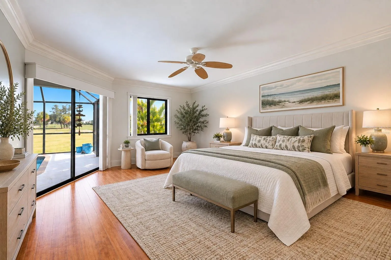 Primary bedroom virtually staged for your viewing pleasure. Lots of natural light, sliders to the lanai, en suite bath, large walk-in closet with custom built-ins