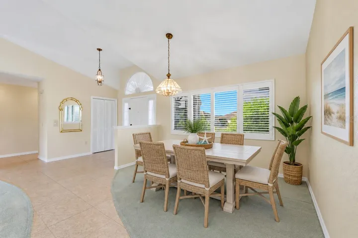 Separate dining room virtually staged for your viewing pleasure - lots of natural light