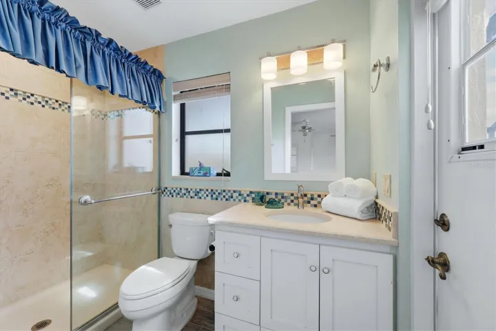 Full bath off of the family room and accessible to the pool area - handy!