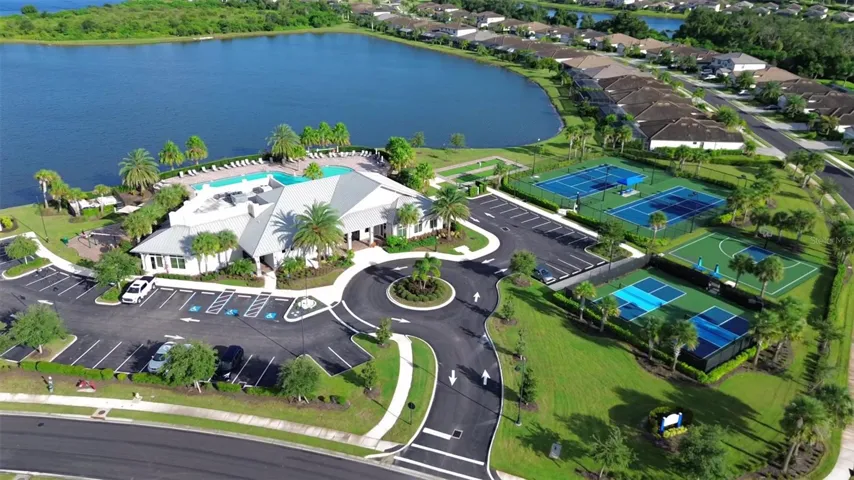 Polo Run amenity center on the lake: clubhouse, pool, tennis and pickleball